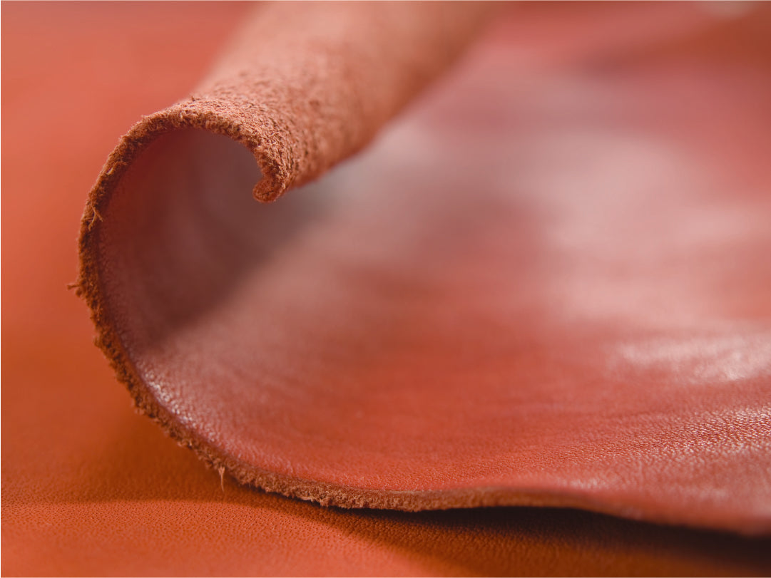 Close up of red leather with a blurred background