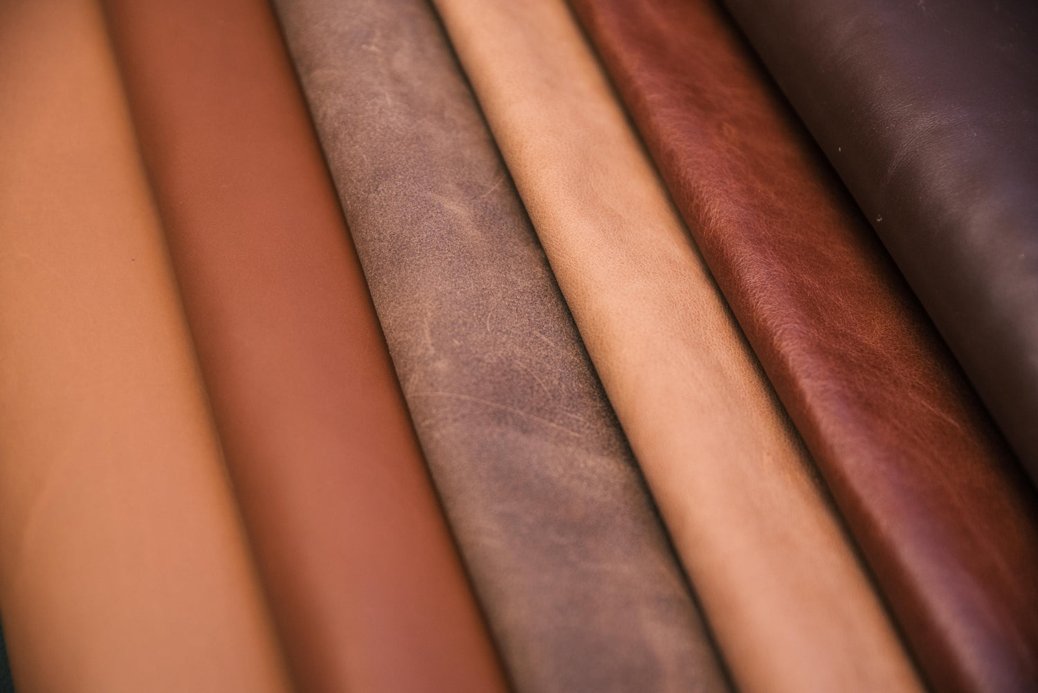 Close-up of various leather samples in different colors.