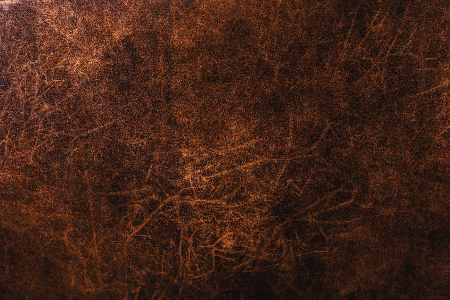 Brown leather texture with visible patina