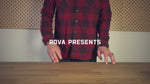 Unboxing video of the ROVA full grain leather journal cover on a wooden desk wearing a plaid shirt.